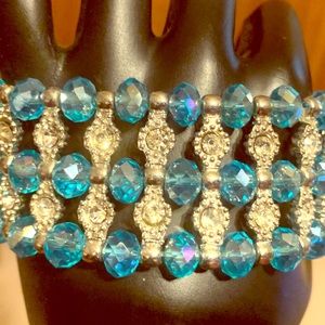 Faceted blue glass bead and simulated diamond